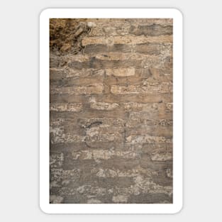 Old brick wall with cracks and scratches. Brick wall background. Distressed wall with broken bricks texture. House facade. Sticker